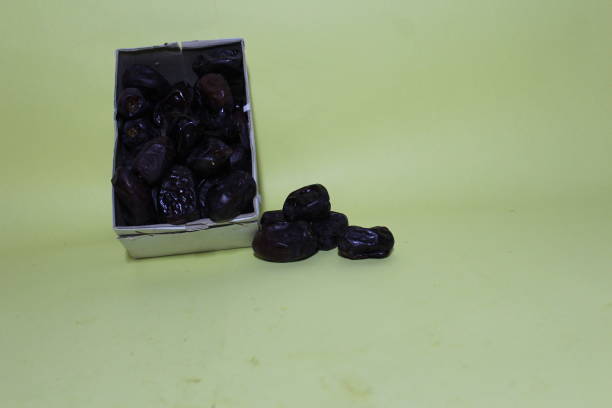 Fate fruit on a light green background