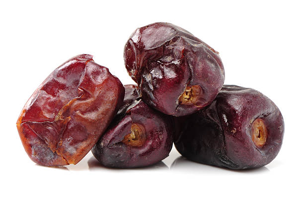 medjool dates on white background